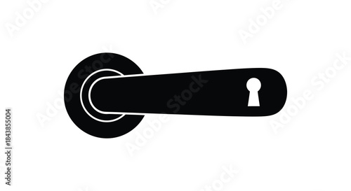 A minimalist black door handle with a keyhole presented in a striking silhouette