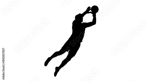 Dynamic Save: A football goalkeeper leaps high, silhouetted against a plain backdrop, capturing the raw power and determination of a critical moment in the game.