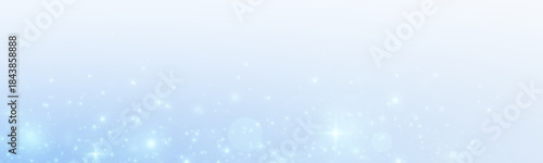 Festive background with sparkling dust and blue stars. Glitter bokeh lights isolated on a transparent background.