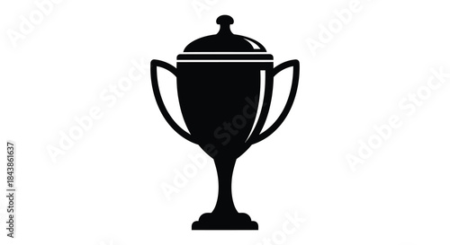 A striking black and white image depicting a classic trophy design in silhouette