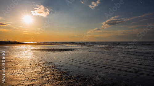 Fototapeta Naklejka Na Ścianę i Meble -  summer sunrise over the lagoon meets the sea, Bibione Pineda, Venice, Italy