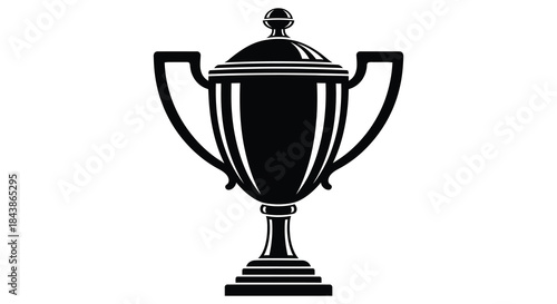 A striking black and white image of a classic trophy design in silhouette