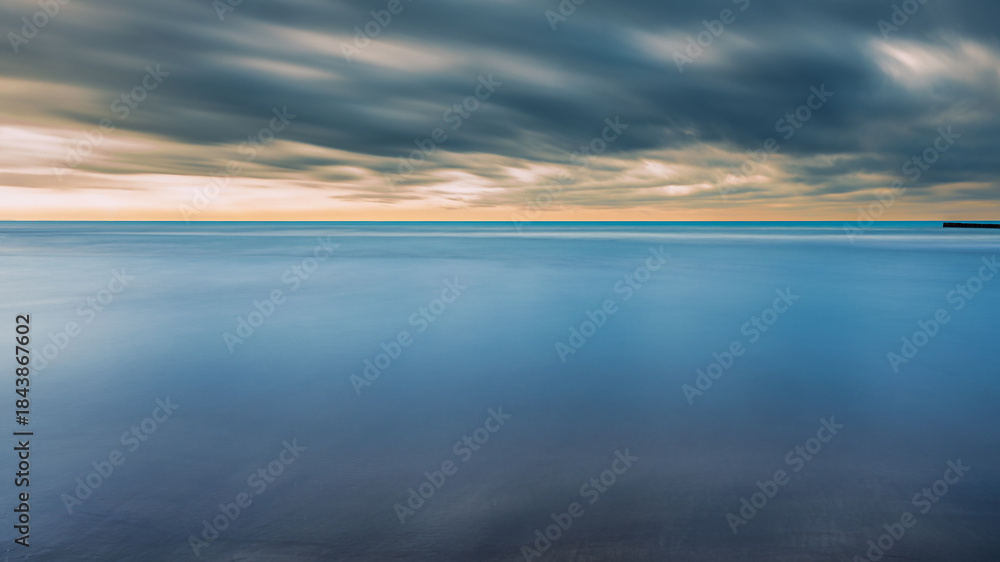 Fototapeta premium summer sunrise over the lagoon meets the sea, Bibione Pineda, Venice, Italy