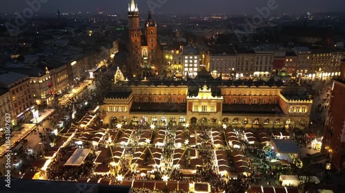 Wallpaper Mural Krakow, Poland, evening hyperlapse view of Main Square with Christmas Fairs, Cloth Hall, Town Hall Tower and St Mary's church
 Torontodigital.ca