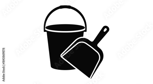 A simple black and white illustration of a bucket and shovel presented as a silhouette