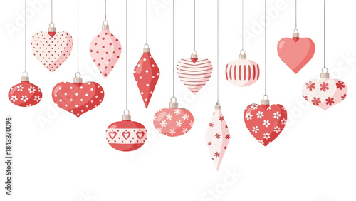 A collection of festive red and pink heart-shaped and diamond-shaped Christmas ornaments with various patterns hanging against a white background.