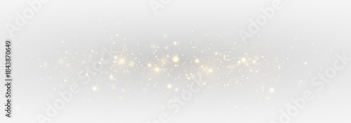 Glistering sparkle and golden confetti in a dynamic shimmer effect. Transparent light elements and soft blur create a colourful abstract celebration.