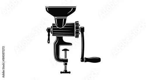 A vintage manual coffee grinder presented in a striking black silhouette