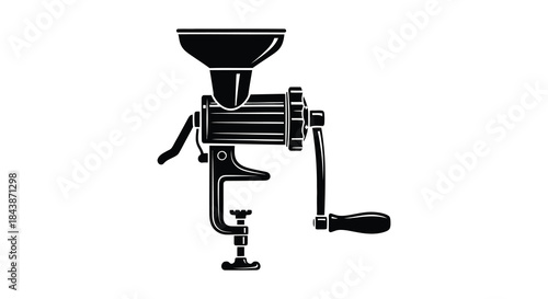 Antique manual coffee grinder depicted in a striking black and white silhouette