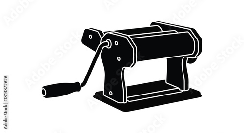 a black silhouette of a vintage pasta maker machine beautifully isolated on a white background silhouette