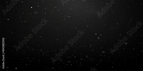 Falling snow flakes on a black night sky with abstract blue light, perfect for a cold winter Christmas animation. astronomy, space, stars, universe, water, dust, cosmos, galaxy, white, nature, star