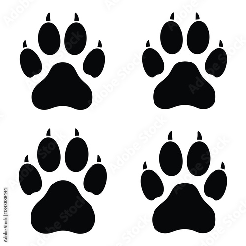 Four black animal paw prints on white background