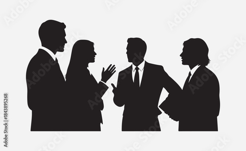Silhouette of four businesspeople in discussion
