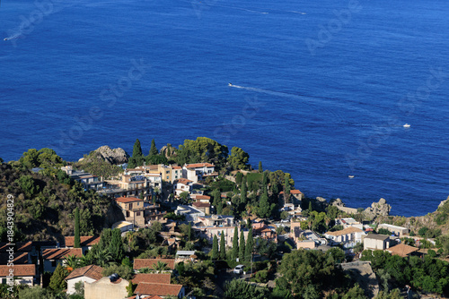 Taormina and resort Giardini Naxos. View on town Taormina and resort Gardini Naxos on Ionian coast, Sicily