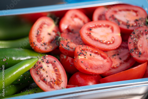 Fresh Cherry Tomatoes and Green Chili Peppers with Black Pepper Seasoning