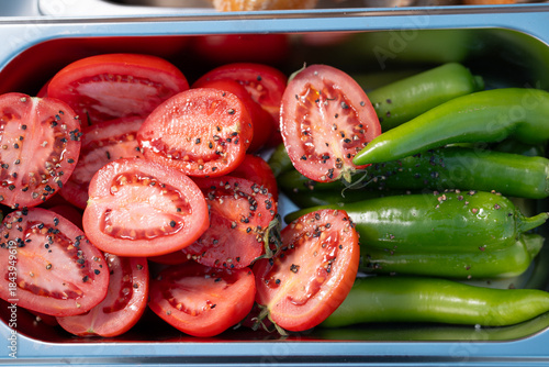 Fresh Cherry Tomatoes and Green Chili Peppers with Black Pepper Seasoning