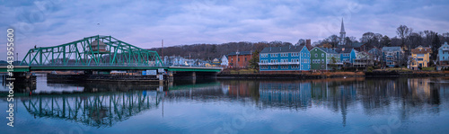Obraz na plátně A New England winter landscape with the landmark Grand Avenue Swing Bridge and h