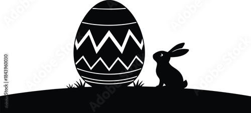 Flat design silhouette close up decorated easter egg and sitting rabbit side view on grassy mound minimal black and white vector holiday icon isolated simple bold