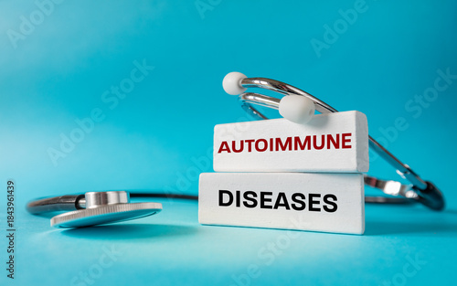 Autoimmune diseases. Concept of health. Immune system disorders. White, wooden blocks with the text 