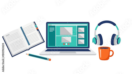 Modern workspace with laptop, headphones, and notebook for creative work