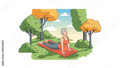 Elderly woman practicing yoga outdoors in autumn forest setting