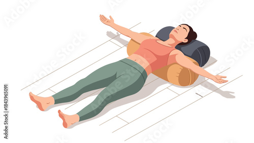 Woman relaxing in restorative yoga pose with cushions on wooden floor