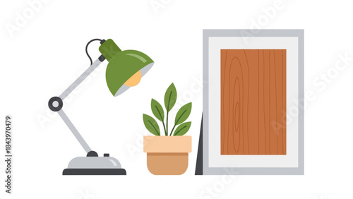 Minimalist desk setup with lamp, plant, and blank picture frame