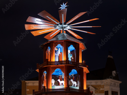 Traditional German Christmas Pyramid Illuminated at Night
