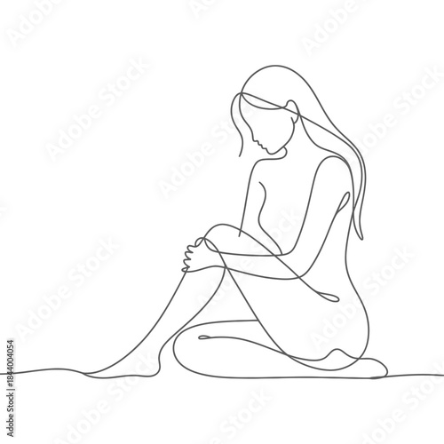 A delicate one line drawing of a woman seated and embracing her knees