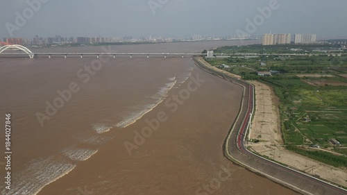 Aerial view of Tides on the Qiantang River in China. High quality 4k footage