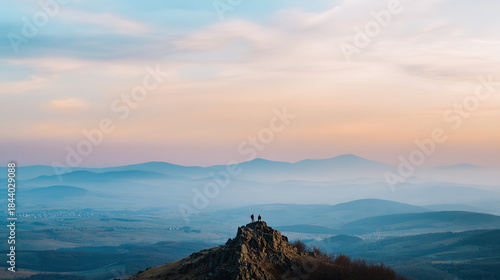 climbers. Mountain peak landscape with two climbers silhouette against a vibrant sunrise sky. travel magazines, destination branding, designed for travel destination branding, used by ux designers.
