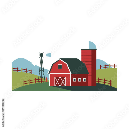 Red barn with silo and windmill on a farm with rolling hills