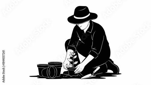 Gardener planting seedlings in pots wearing a hat and dark clothing.