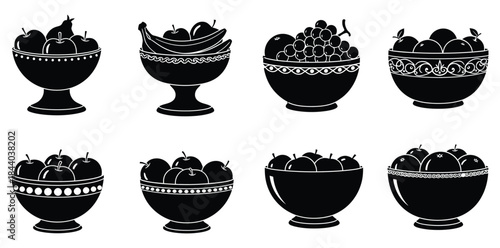 Fruit bowl silhouettes featuring apples bananas grapes and pears in various styles