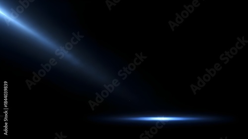 Cinematic Blue Volumetric Light Rays on Black Background - Atmospheric Beam Overlay