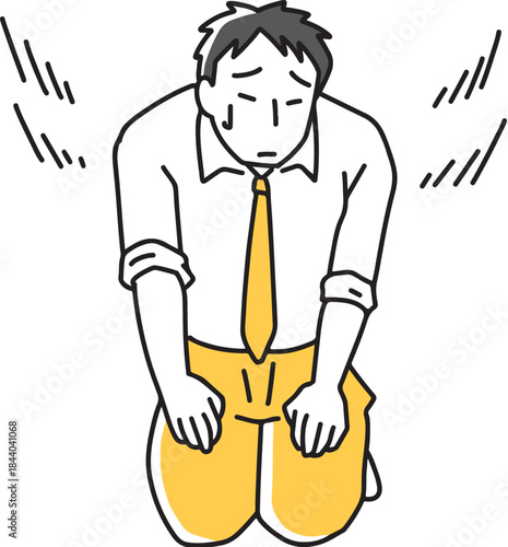 正座して反省する男性社員