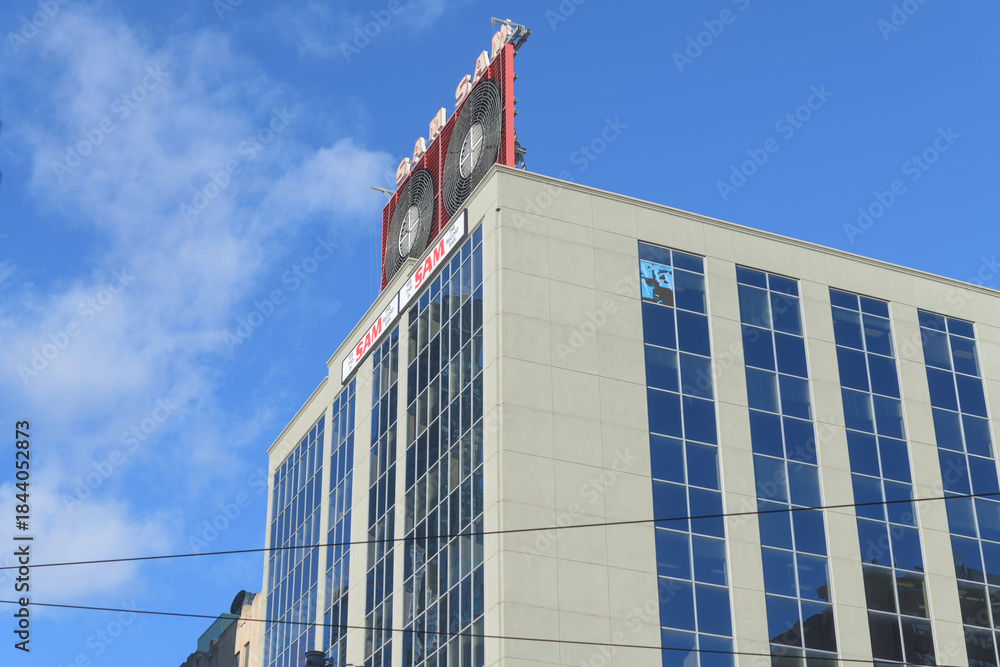 Fototapeta premium Sam The Record Man - Neon Sign atop 277 Victoria St, Toronto