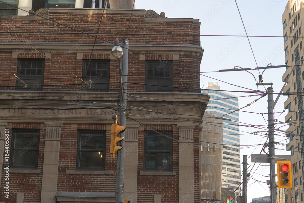 Naklejka premium detail of facade of The Sterling Bank of Canada, at 260 Church Street, southwest corner of Church and Dundas St E in Toronto