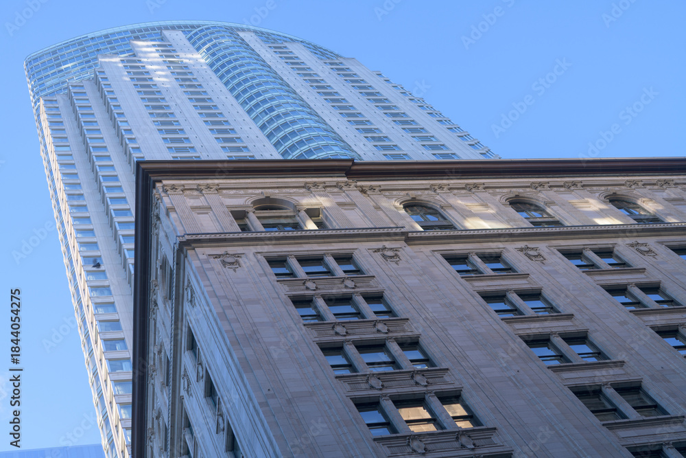 Naklejka premium oblique skyward view of One King St W, an ornate 1914 Dominion Bank Building in Beaux-Art style, and
