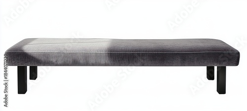 Minimal low-profile gray upholstered bench with black legs casting a soft shadow, calm elegant modern seating