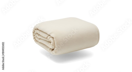Cozy cream-colored blanket folded neatly, symbolizing comfort and warmth for home relaxation