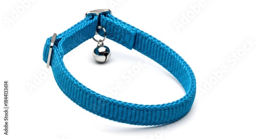 Close-up of a stylish blue fabric pet collar featuring a shiny silver bell, an essential accessory for feline identification and pet safety