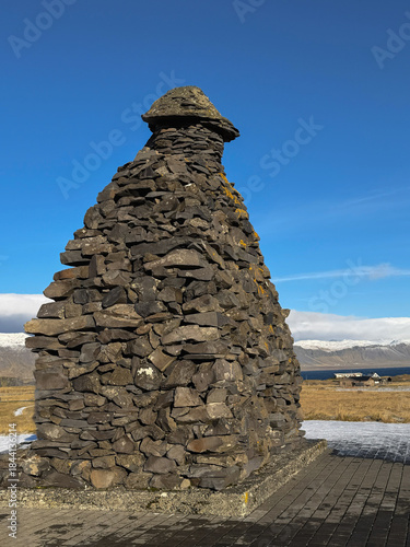  Bárður Snæfellsás Statue on the Snæfellsnes Peninsula, featuring sweeping views of the ocean, mountains, and dramatic coastal cliffs in western Iceland. 