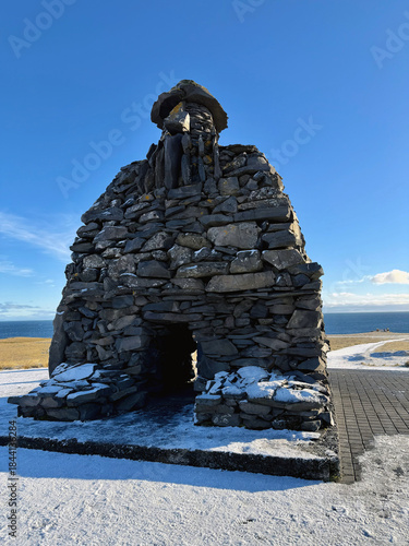 Bárður Snæfellsás Statue on the Snæfellsnes Peninsula, featuring sweeping views of the ocean, mountains, and dramatic coastal cliffs in western Iceland. 