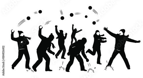 Joyful group of people having a playful snowball fight outdoors in winter