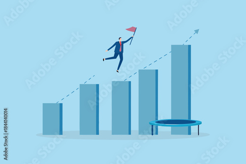 Business person leaping towards success on a growing bar graph with a trampoline