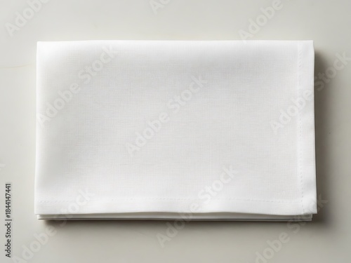 Wallpaper Mural Elegant folded white linen napkin on a neutral surface with soft shadows Torontodigital.ca