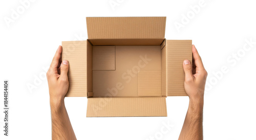Photos Open empty cardboard box held by hands from top view, isolated on white backgrou