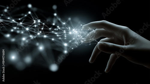 Hand Reaching Out to Touch a Digital Network Concept Representing Technology and Innovation with Glowing Nodes and Connections in Dark Background