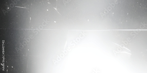 retro film overlay effect with scratch dust and blur light,  retro grain noisy film distressed texture light flare on black background, black and white abstract light background, grunge pattern